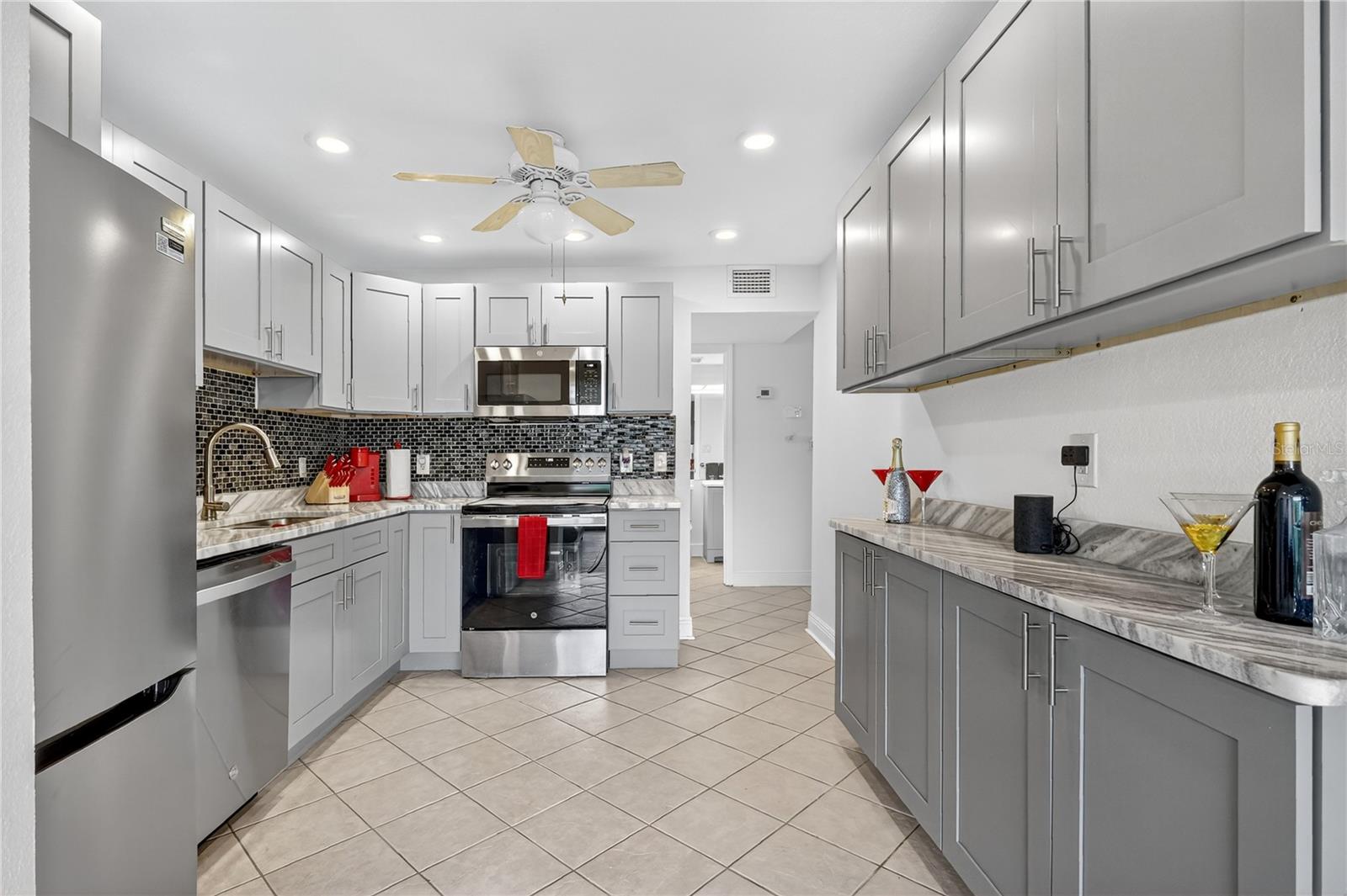 Modern kitchen opens to the family room.