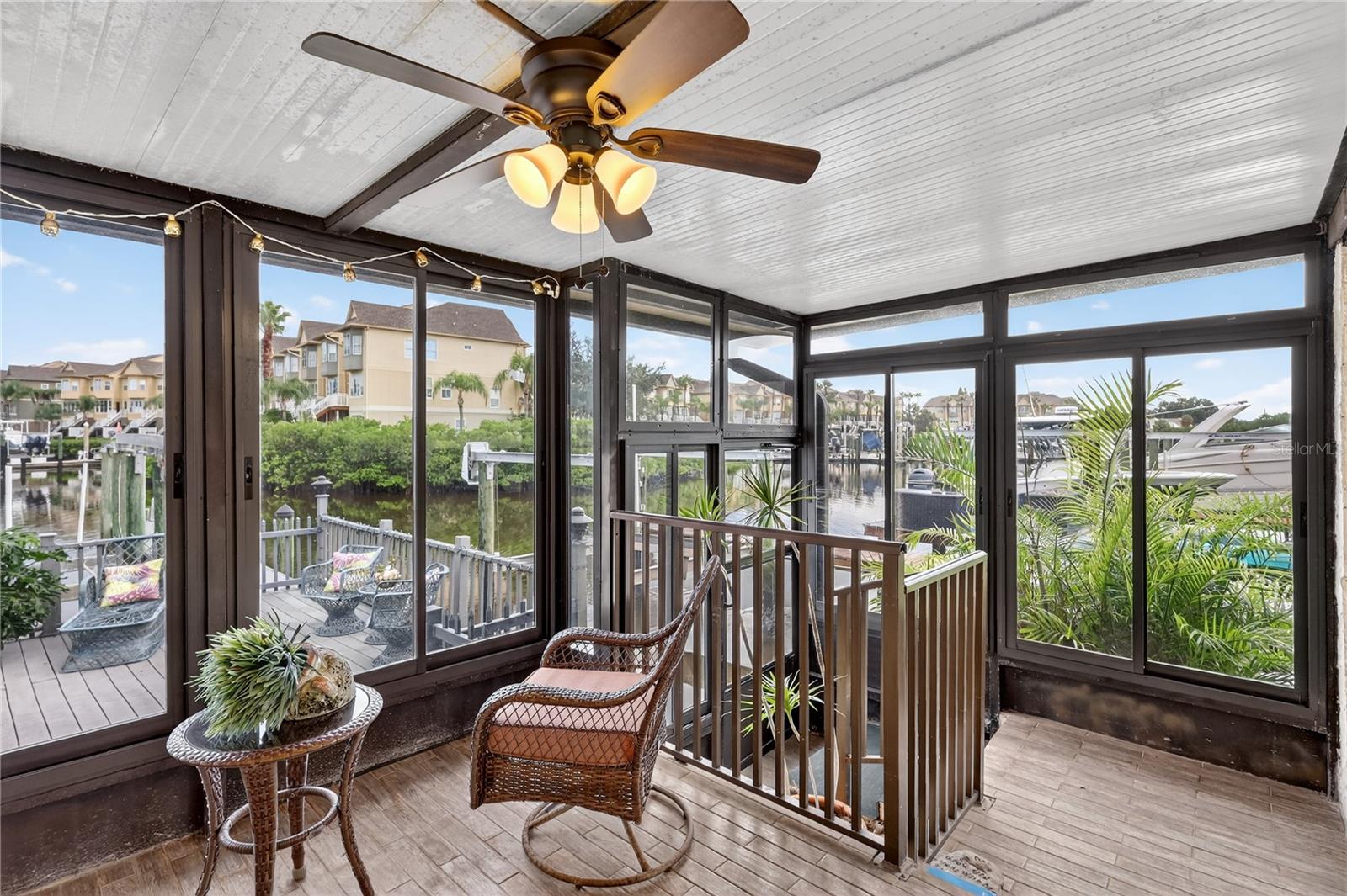 Enclosed patio off the family room with windows/screens.