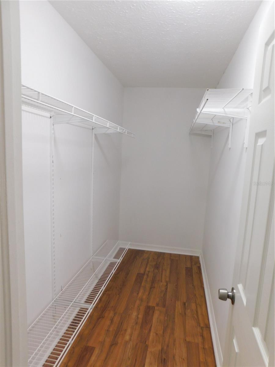 Primary Bedroom walk-in closet