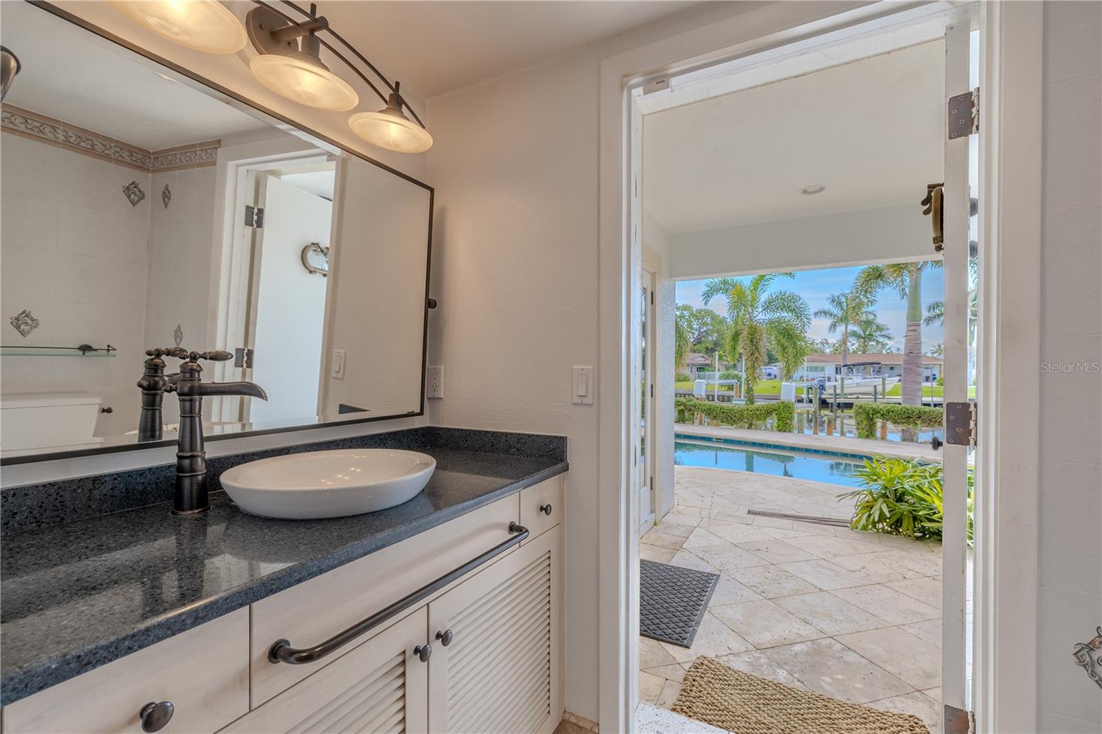 3rd bathroom with access to the pool.