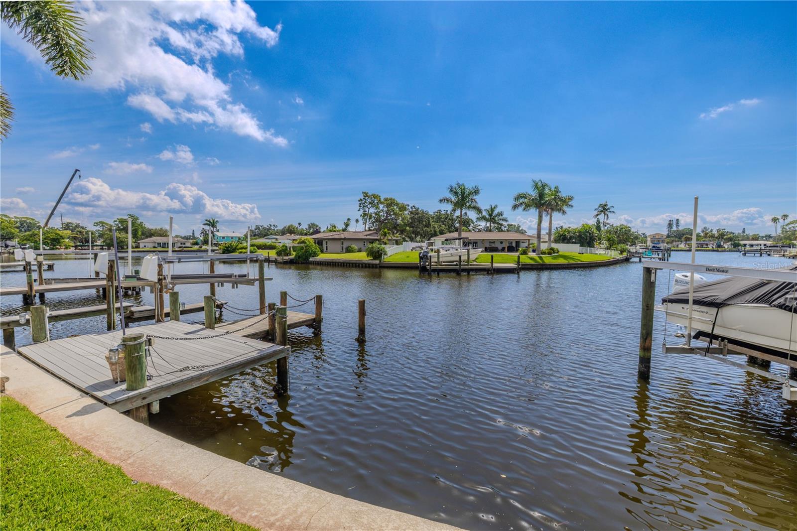 This property sits along a wide, natural canal offering scenic views and smooth navigation. With direct bay access both north and south, it’s an ideal location for boating enthusiasts who want quick and easy routes to open water.
