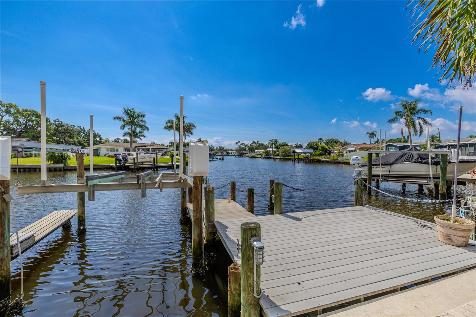 This property sits along a wide, natural canal offering scenic views and smooth navigation. With direct bay access both north and south, it’s an ideal location for boating enthusiasts who want quick and easy routes to open water.