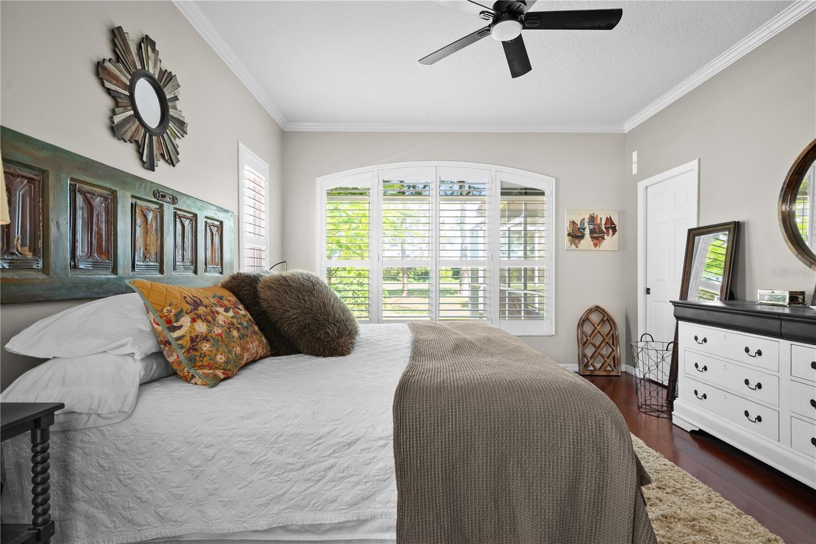 custom plantation shutters in primary bedroom!