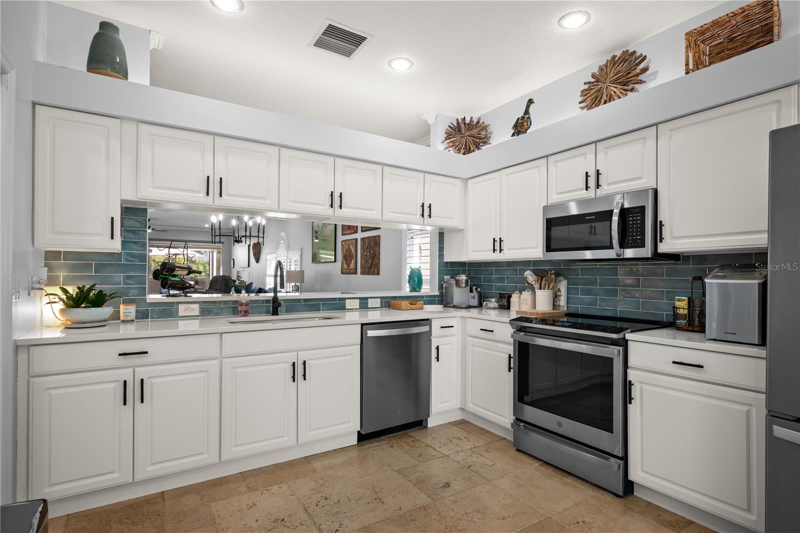 Kitchen with stunning travertine