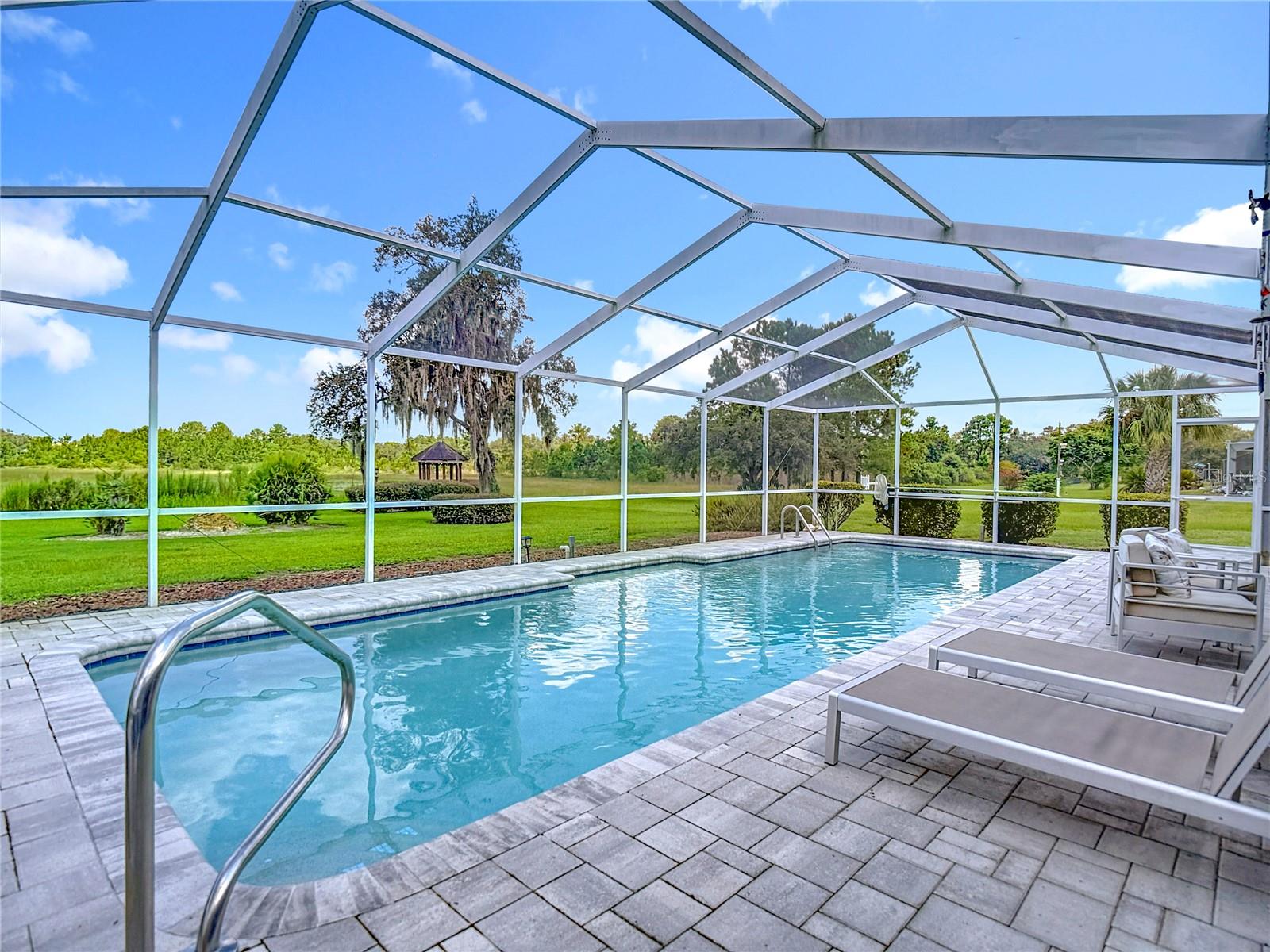 Pool & back yard on the water.