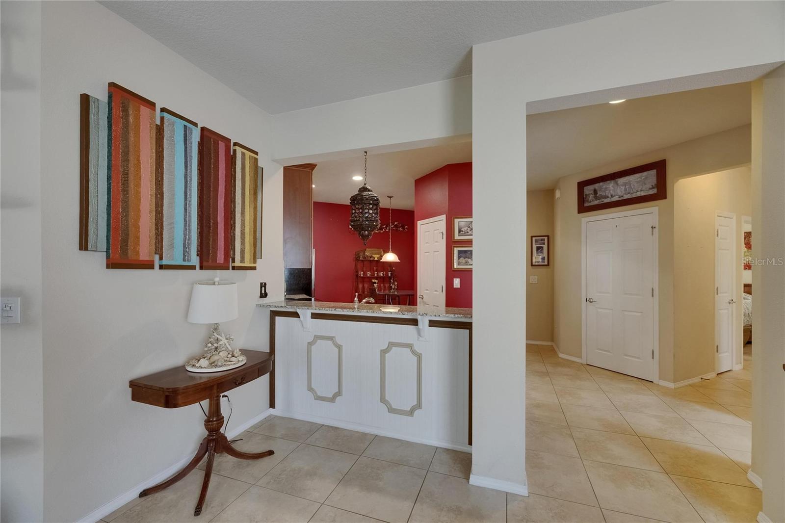 Looking into kitchen/bar stool area