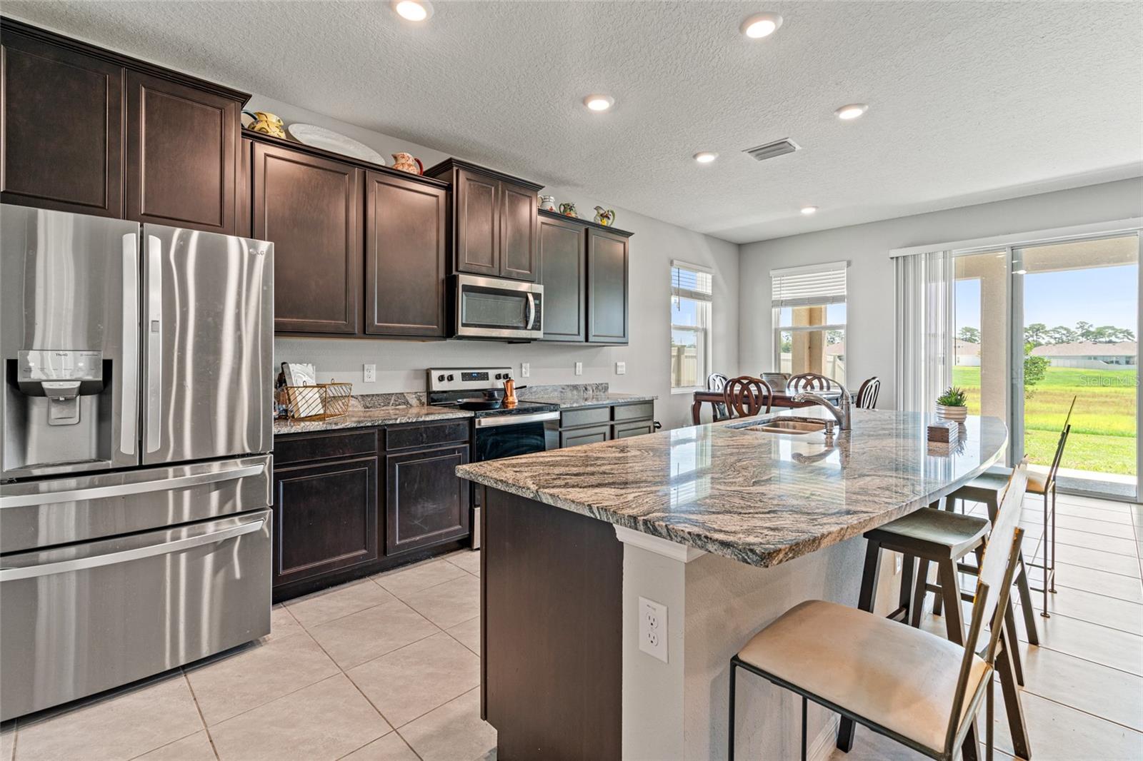 stunning kitchen with load of cabinets and counter space
