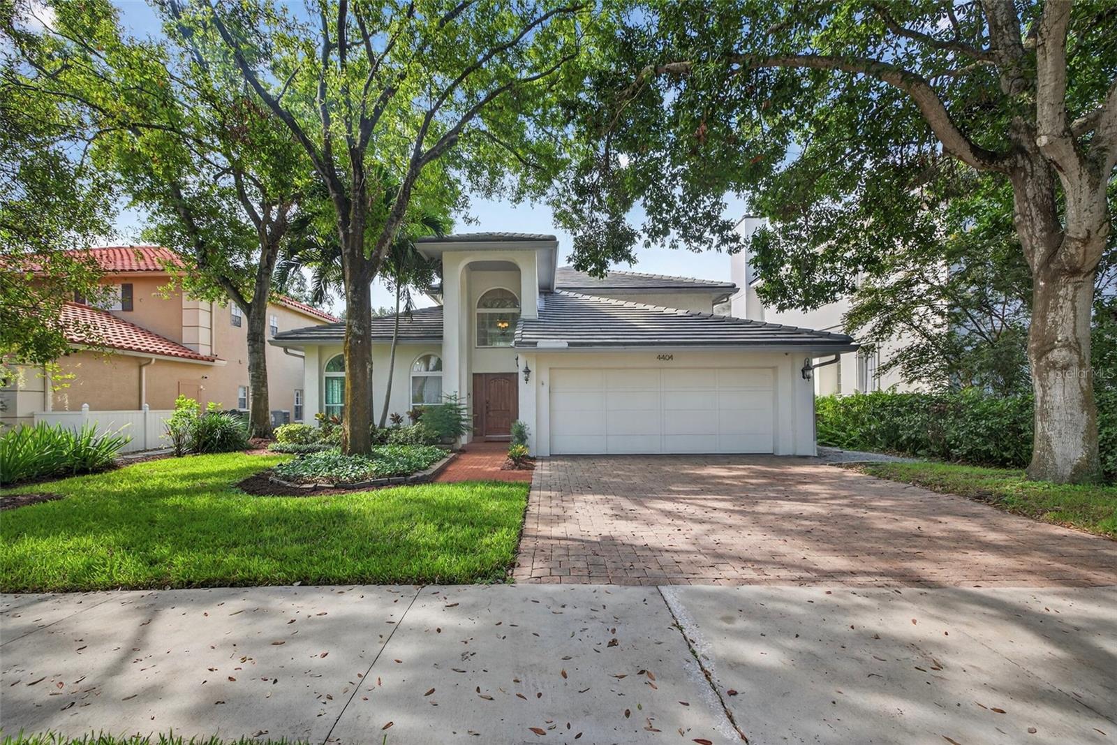Lush mature trees and landscaping