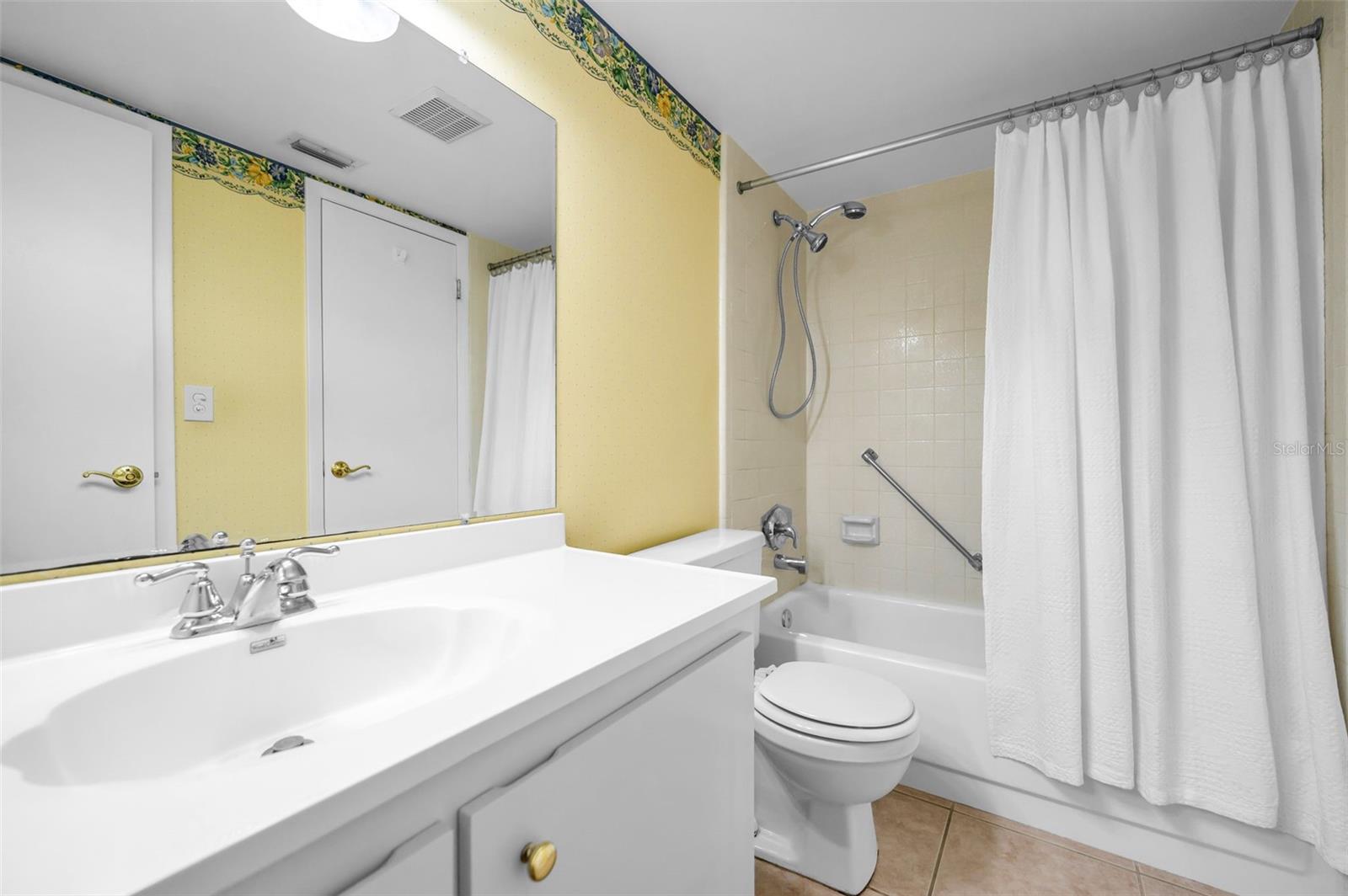 Bathrrom with tub and shower