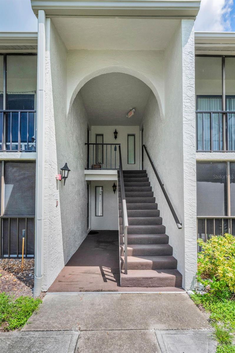 View of front entrance, unit on right