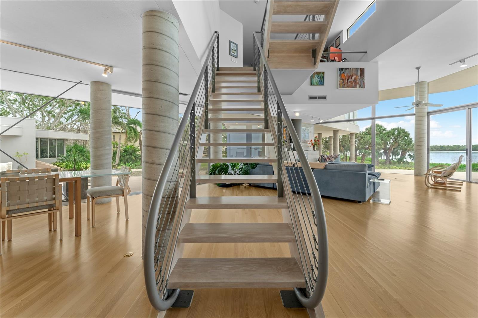 Modern staircase design enhances the home’s open flow.