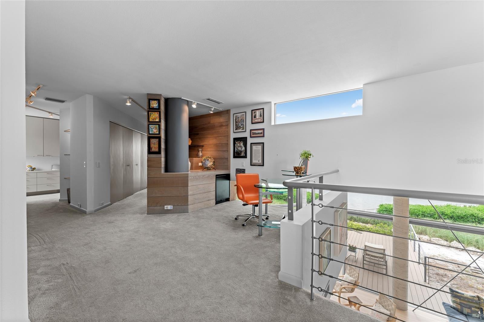At the top of the stairs, the second level is dedicated entirely to the primary retreat..