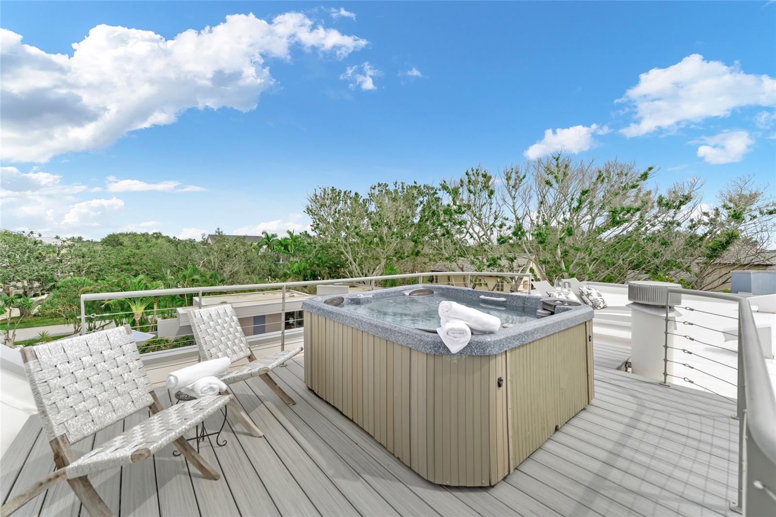 Unwind on the rooftop 'Sky Deck' in or out of the luxurious hot tub!