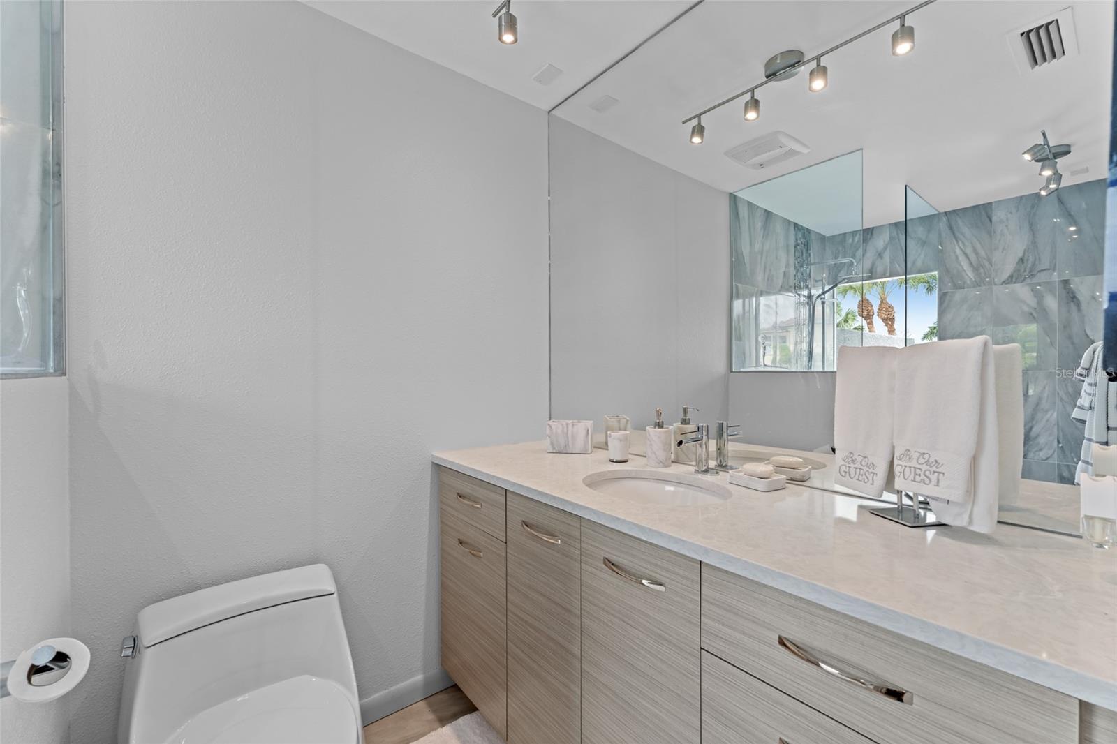Your guests have access to their own full-size luxury bathroom featuring spa-like details!