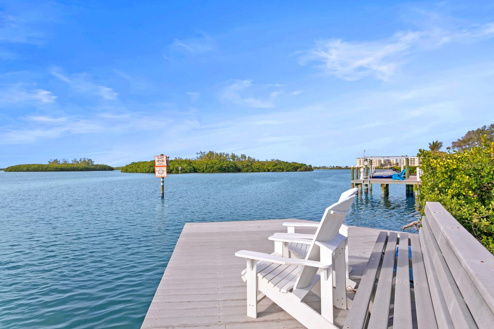 Peaceful dockside seating with breathtaking views of the open water.