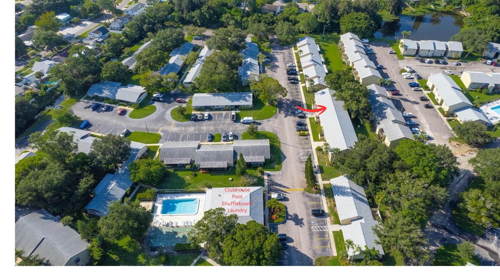 Clubhouse / Pool / Shuffleboard / Laundry and Unit 1506F noted with arrow