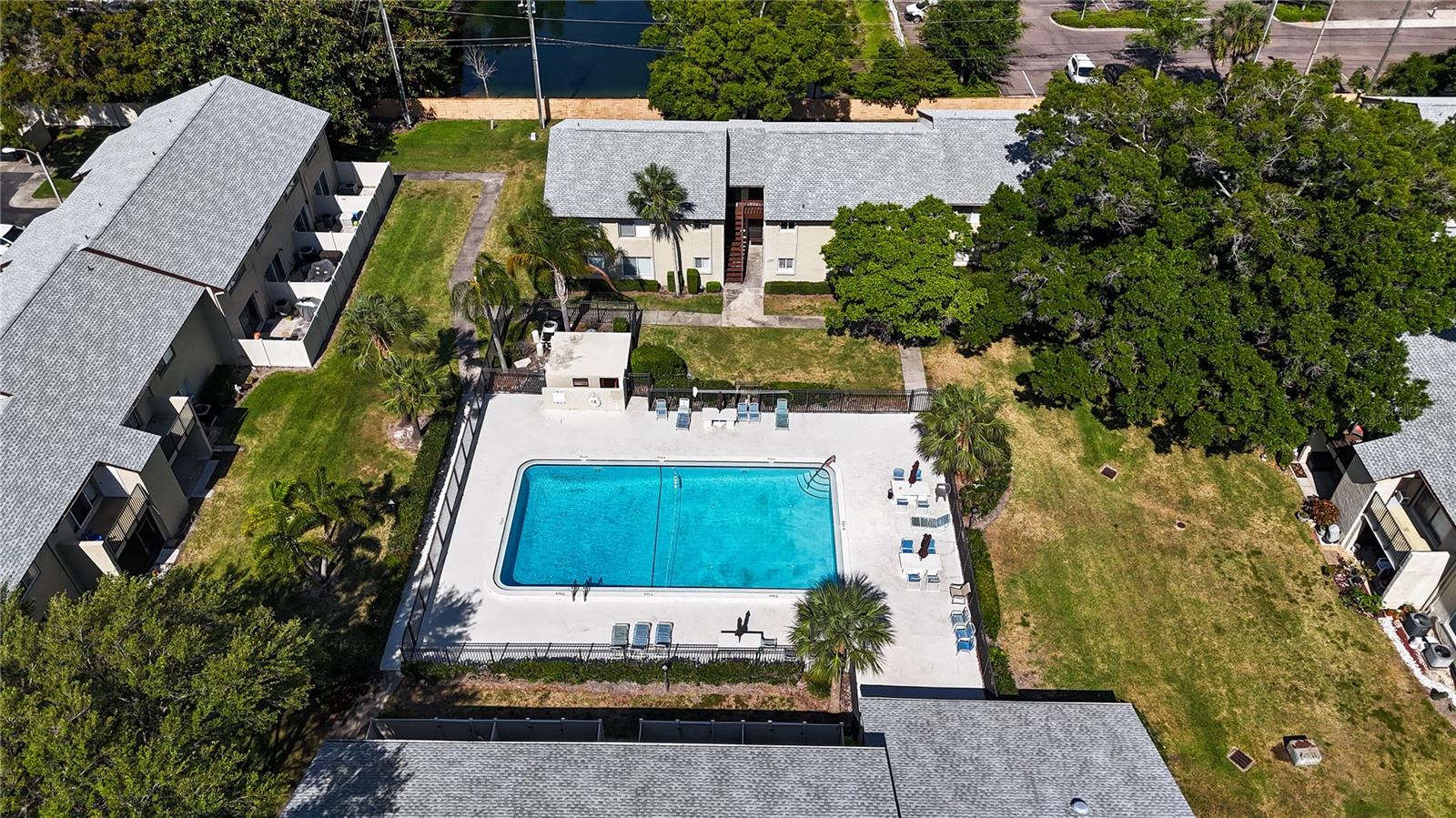 One of THREE sparkling pools at Woodside Village