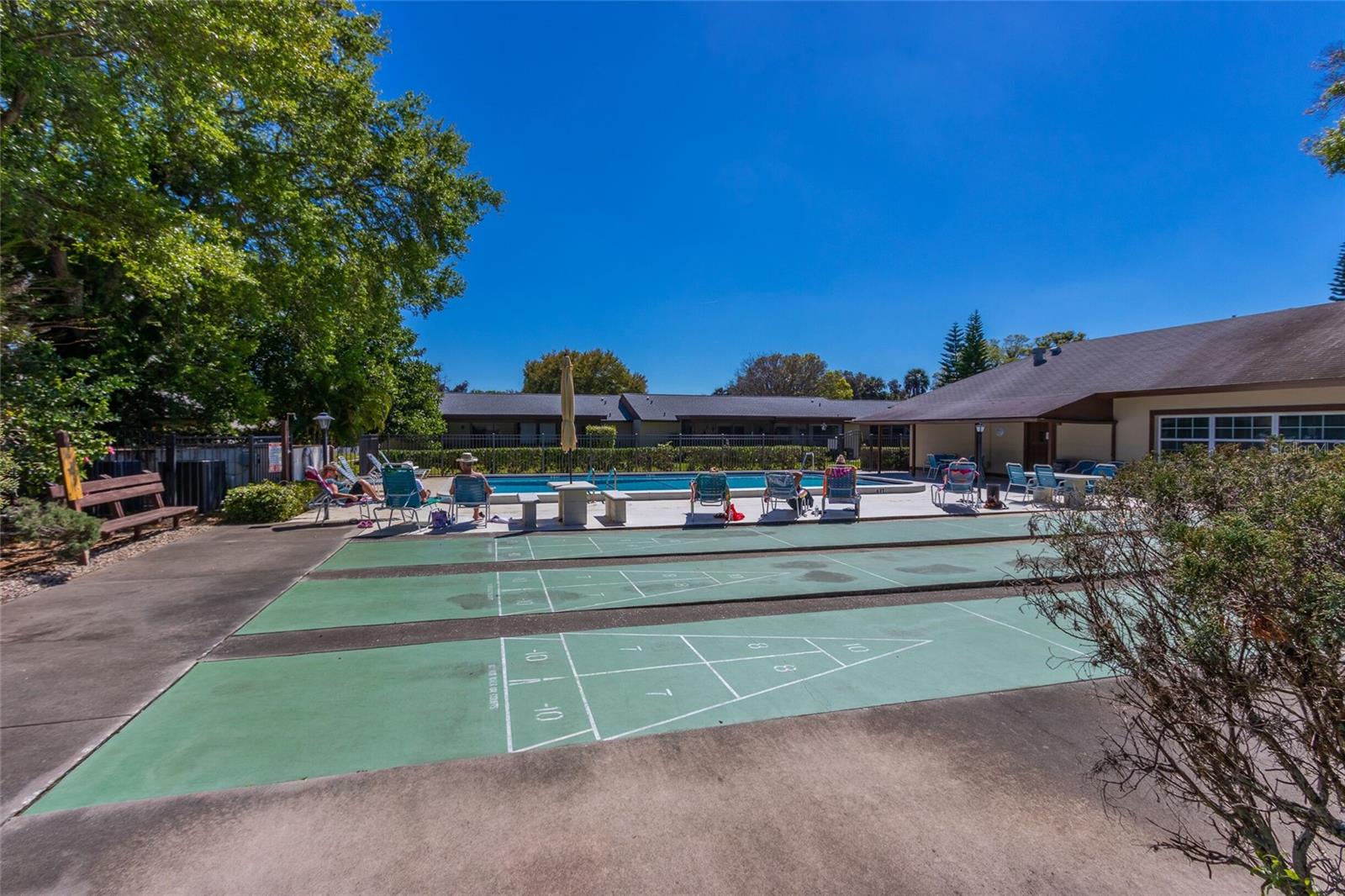 Shuffleboard Courts next to the pool at the  Clubhouse