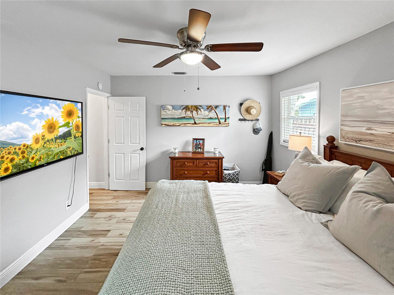 PRIMARY BEDROOM; SPLIT PLAN FOR PRIVACY WITH NEWLY RENOVATED SHOWER BATHROOM