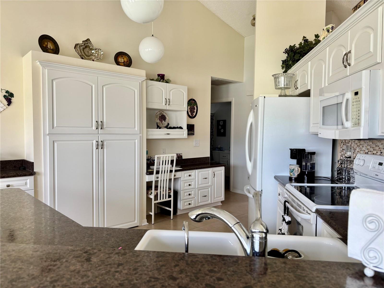 Kitchen with pantry and desk view
