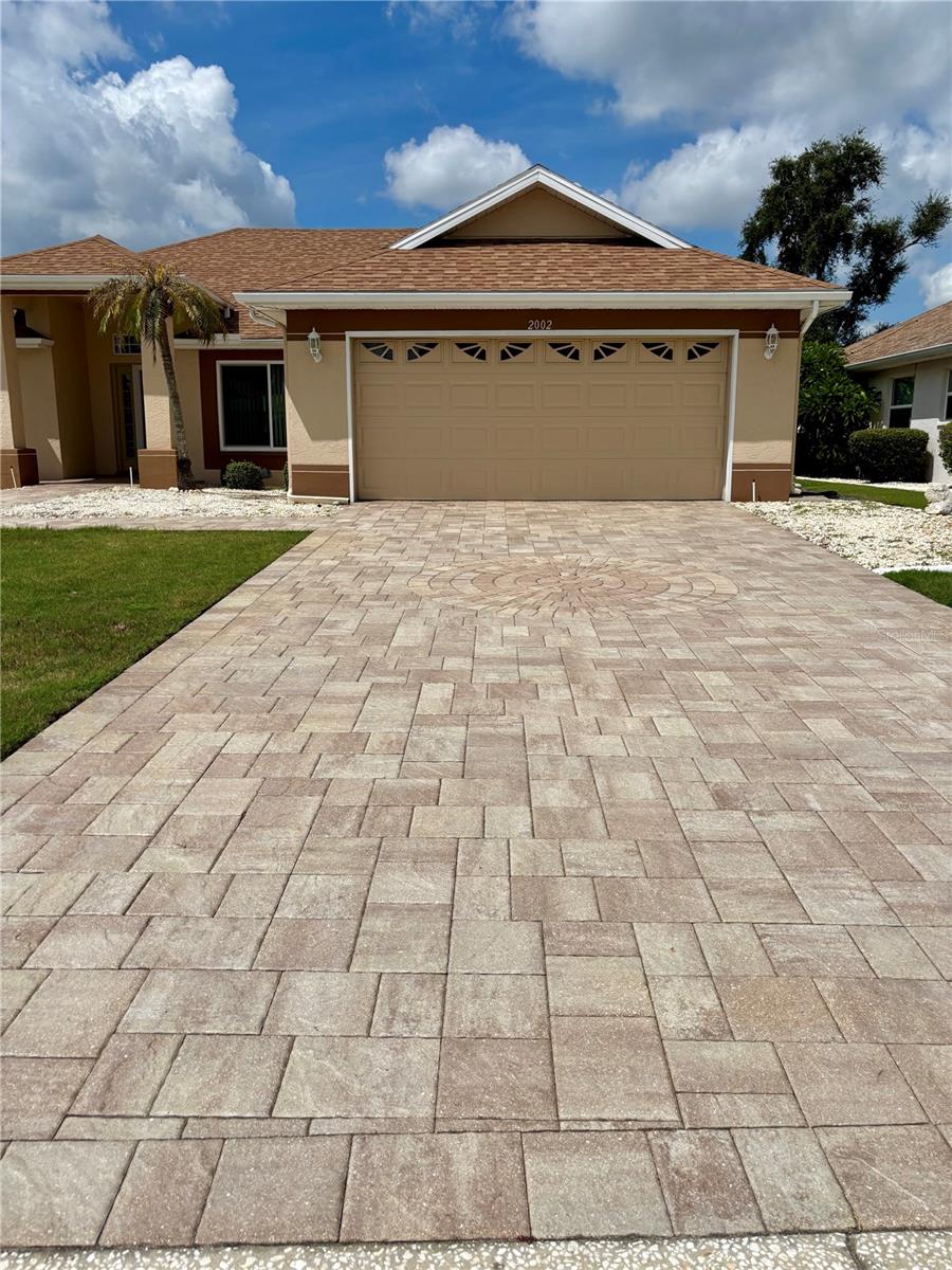 Expanded brick paved driveway