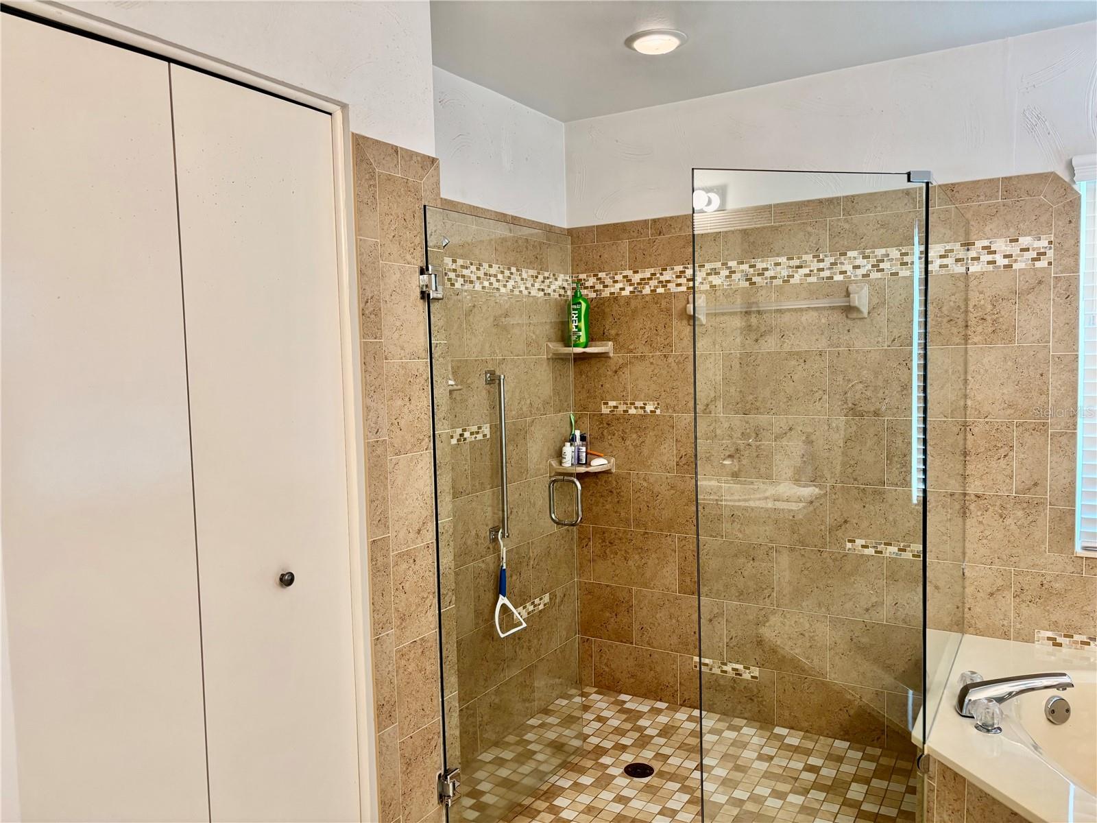 Master shower and linen closet