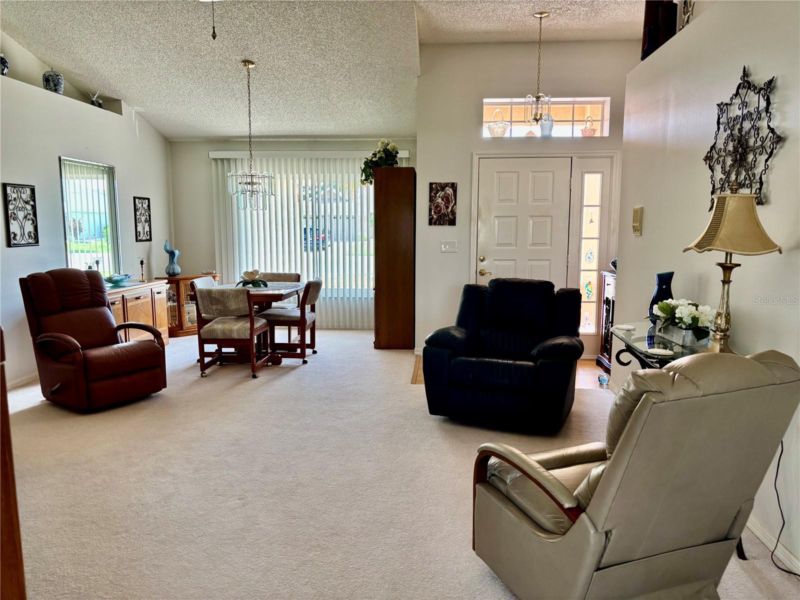 Living room with view of dining room