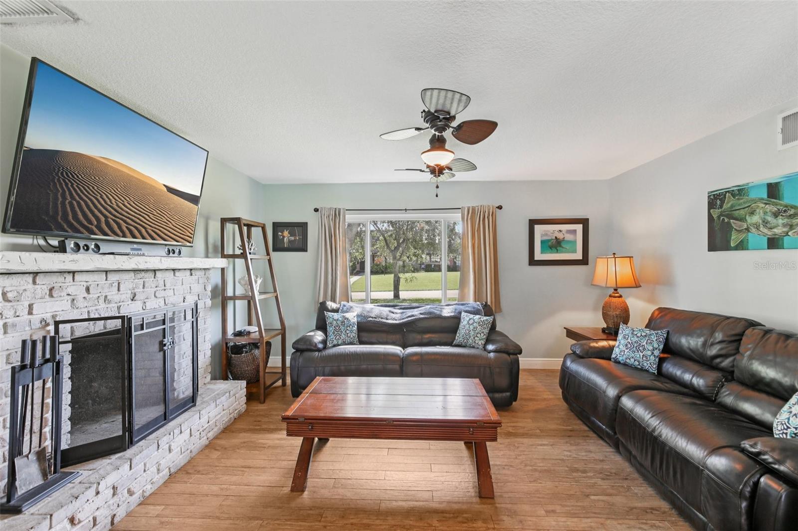 Family Room with UPGRADED windows downstairs