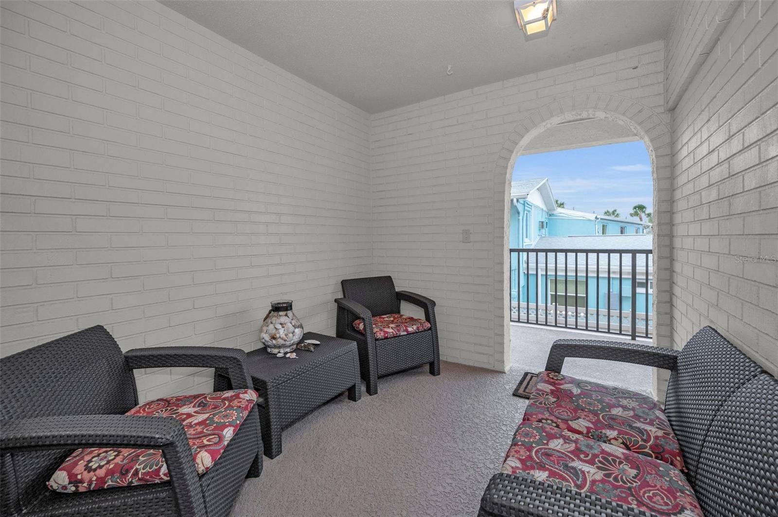 Sizable sitting area in the entry Alcove