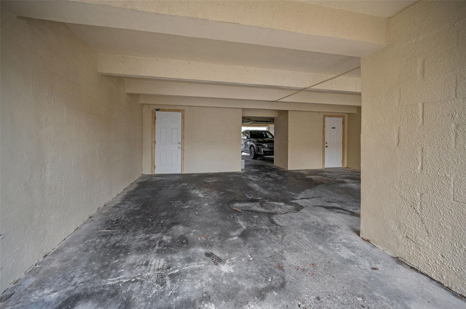 Under Building Deeded Parking Space with extra storage closet