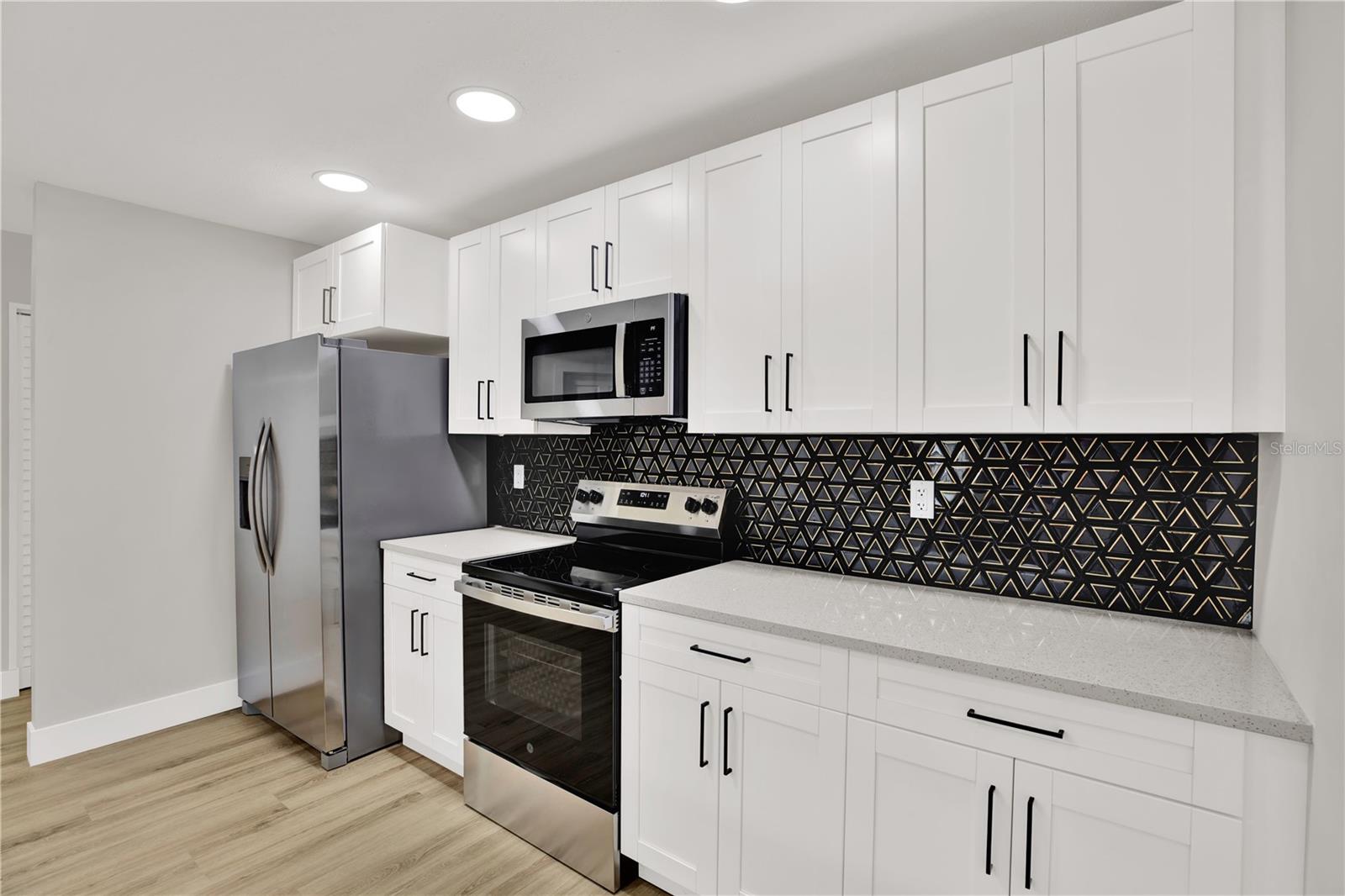 QUARTZ-STYLE CARRARA STONE COUNTERTOPS