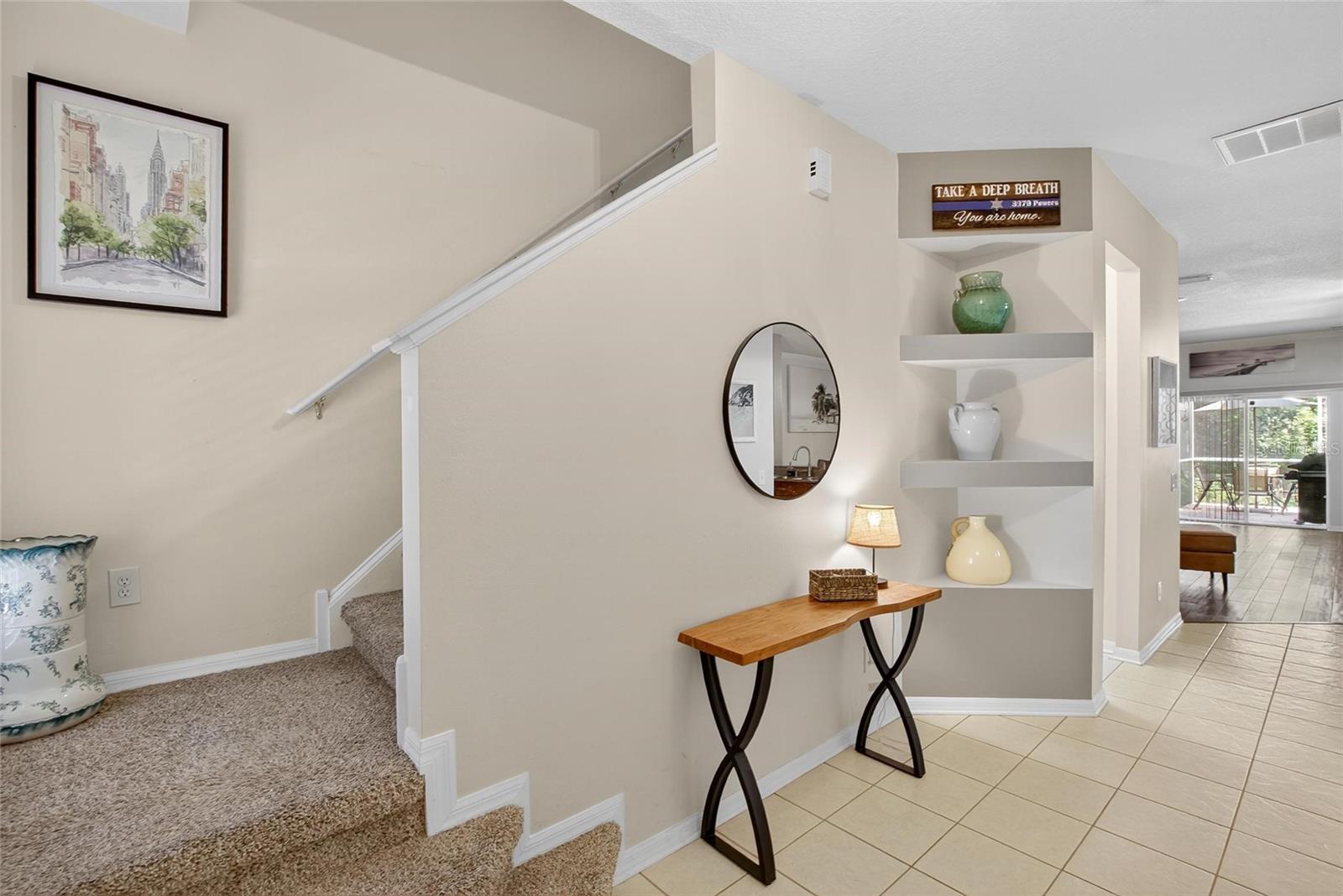 Entryway view to stairs