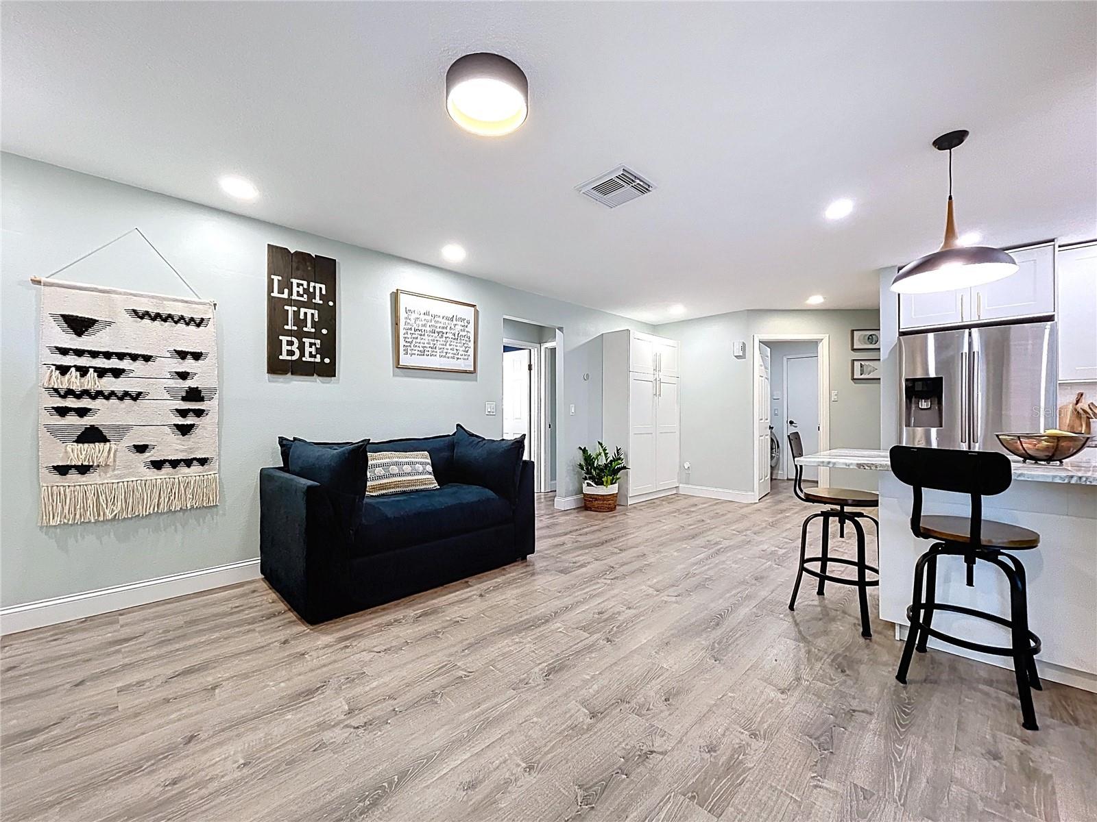 Seamless connection between kitchen and family room, perfect for relaxed living and hosting gatherings.
