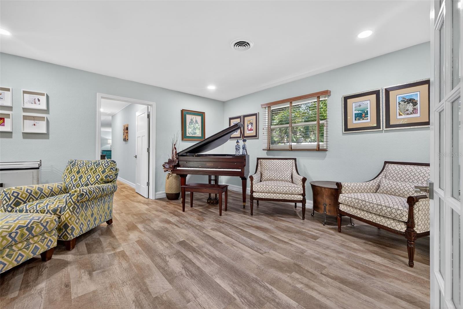 Living Room large enough for various activities for the entire family