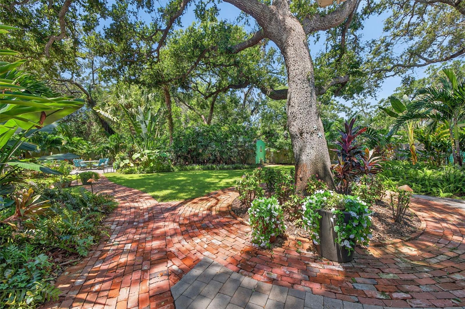 Extremely spacious backyard with custom bricks.