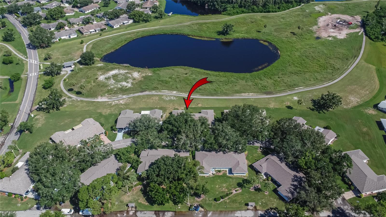 Aerial View w/Pond & Golf Course