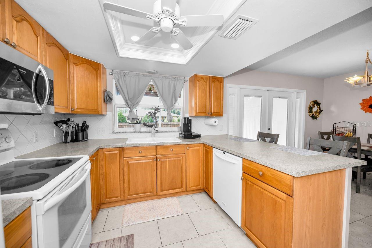 Kitchen offers a great view of the backyard from the sink area.