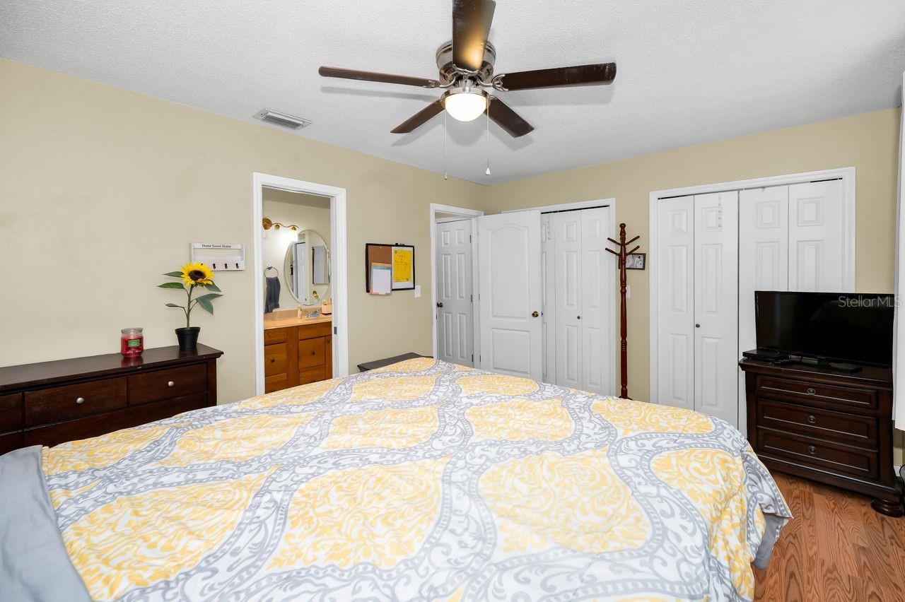 Primary bedroom offers a private entry into bathroom.