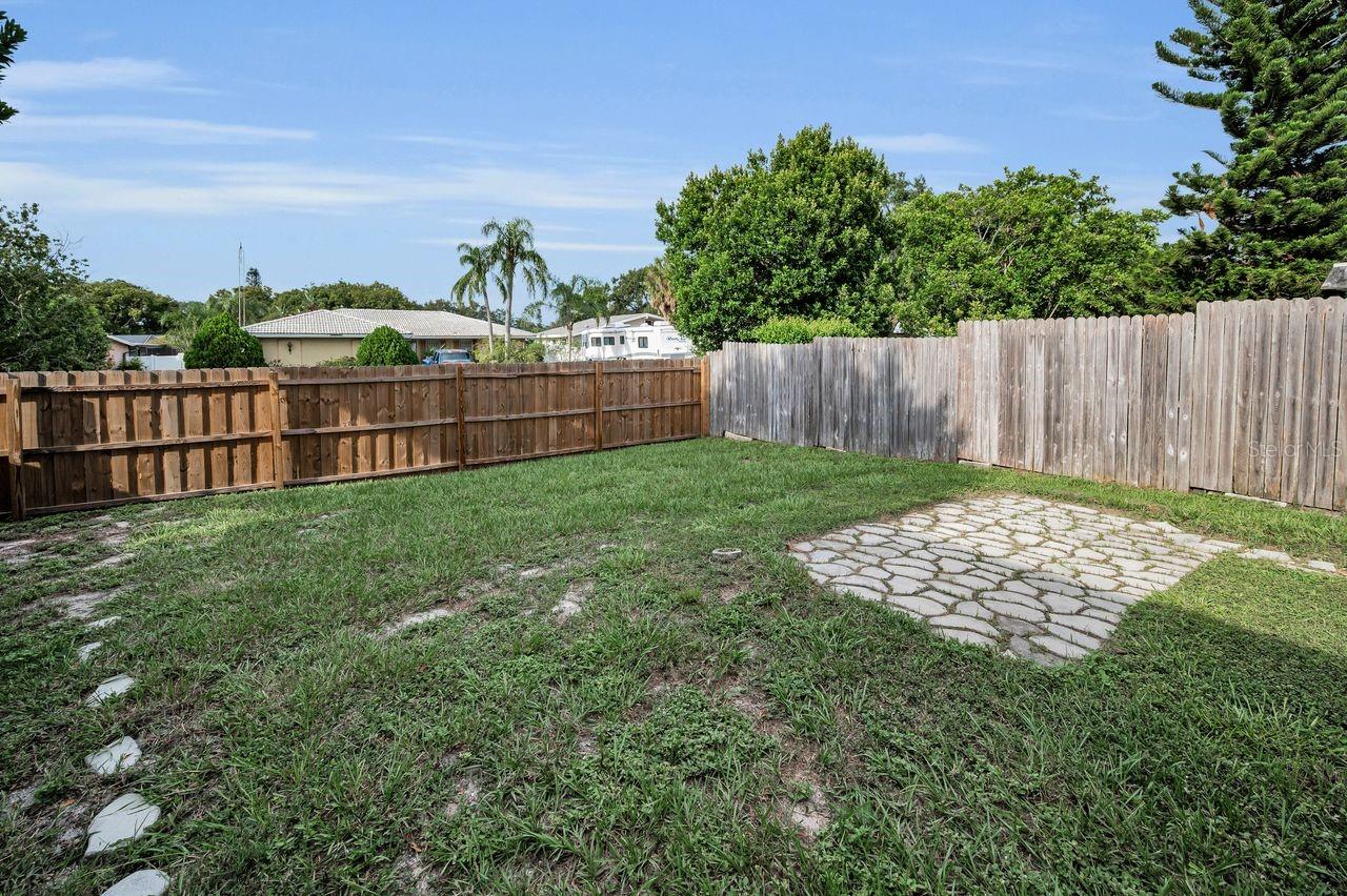 New fence along rear of property.