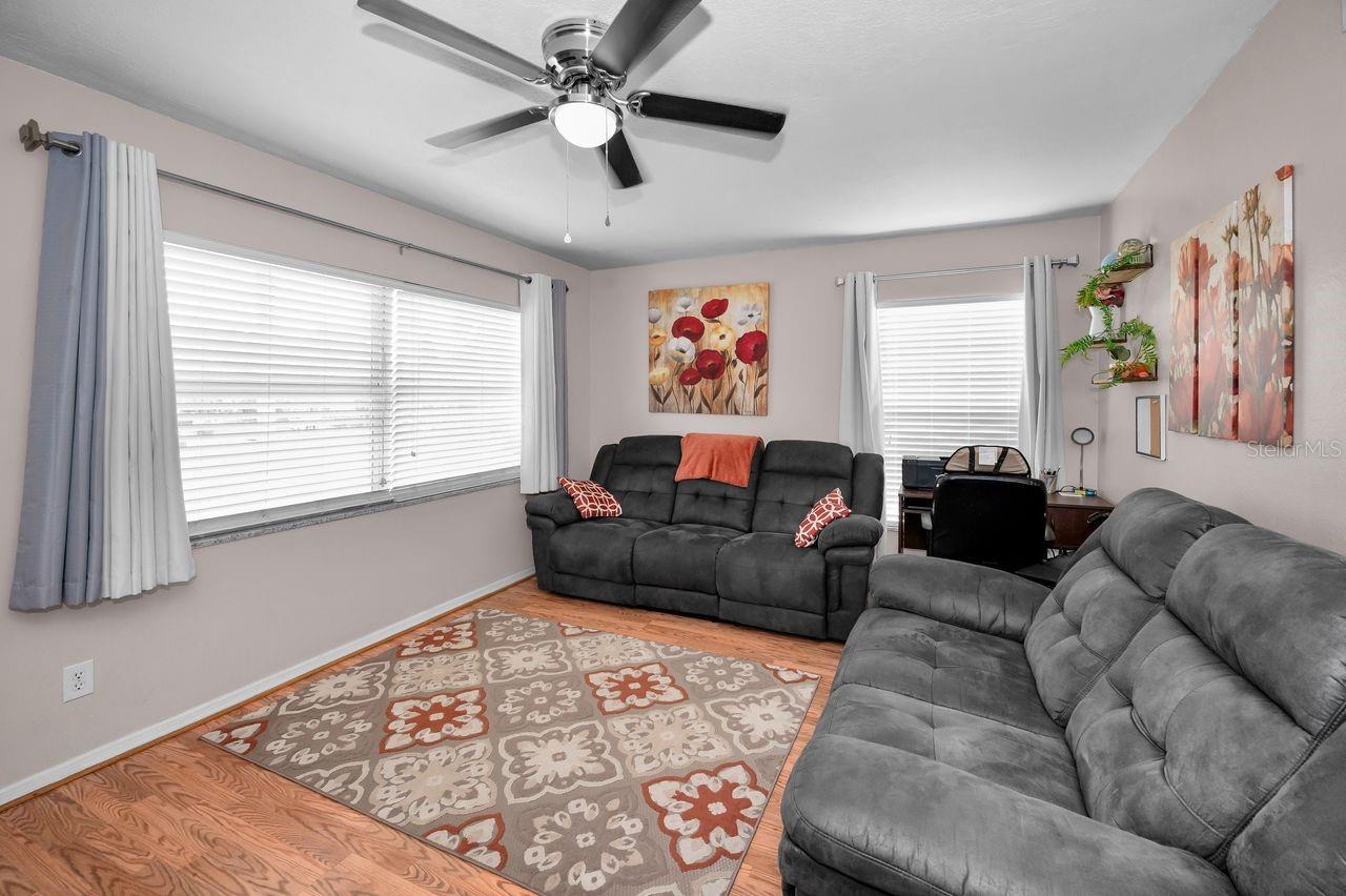 Spacious and natural lighting in this cozy living room.