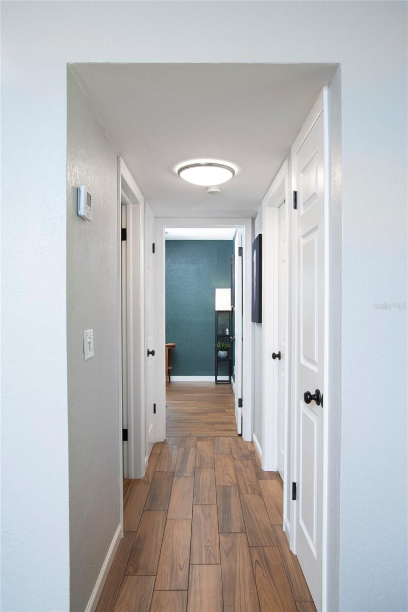 From the living room, you can see the office, right is primary bedroom, left is bathroom.