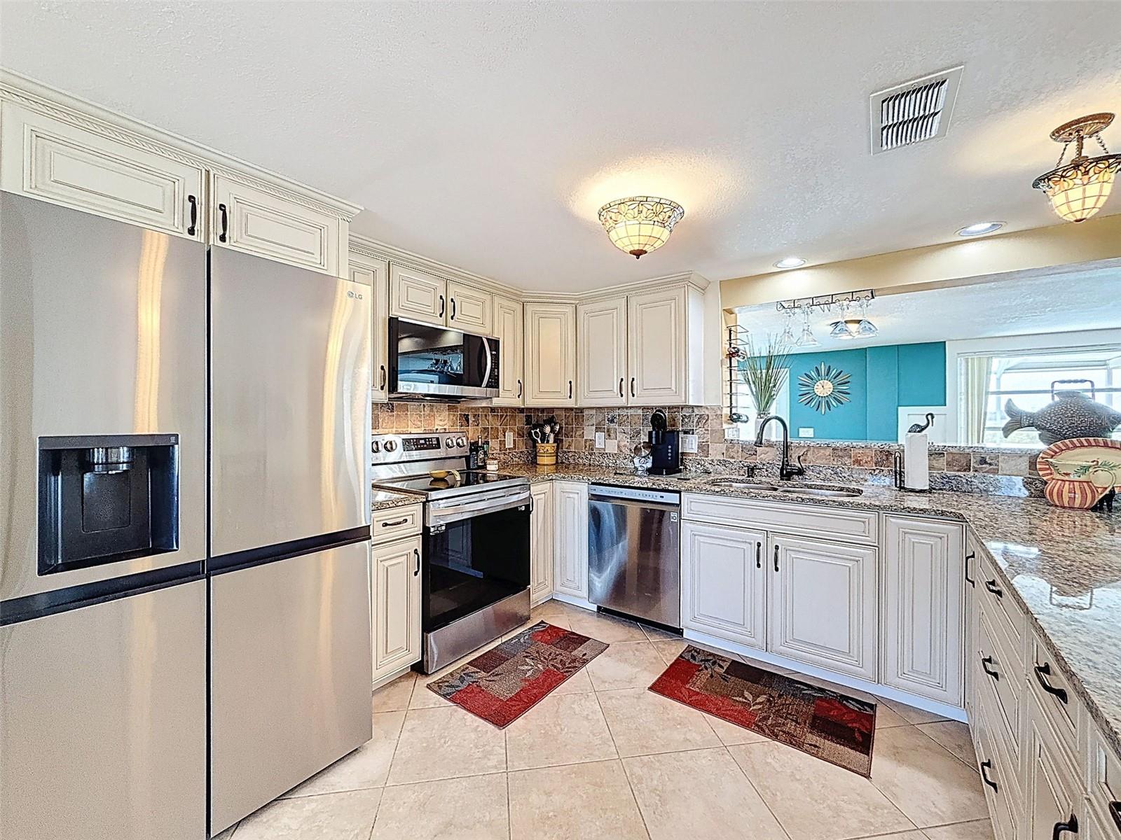 NEW STAINLESS STEEL APPLIANCES.