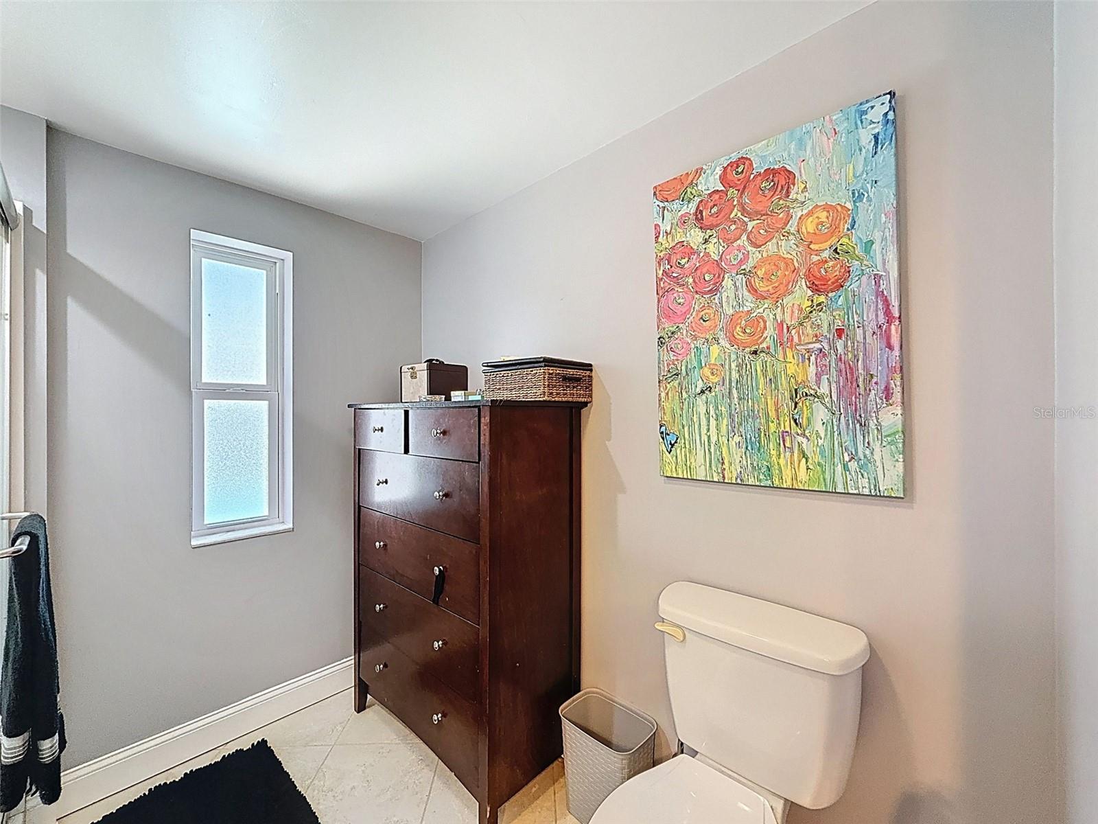 ROOM FOR A DRESSER IN THE BATHROOM.