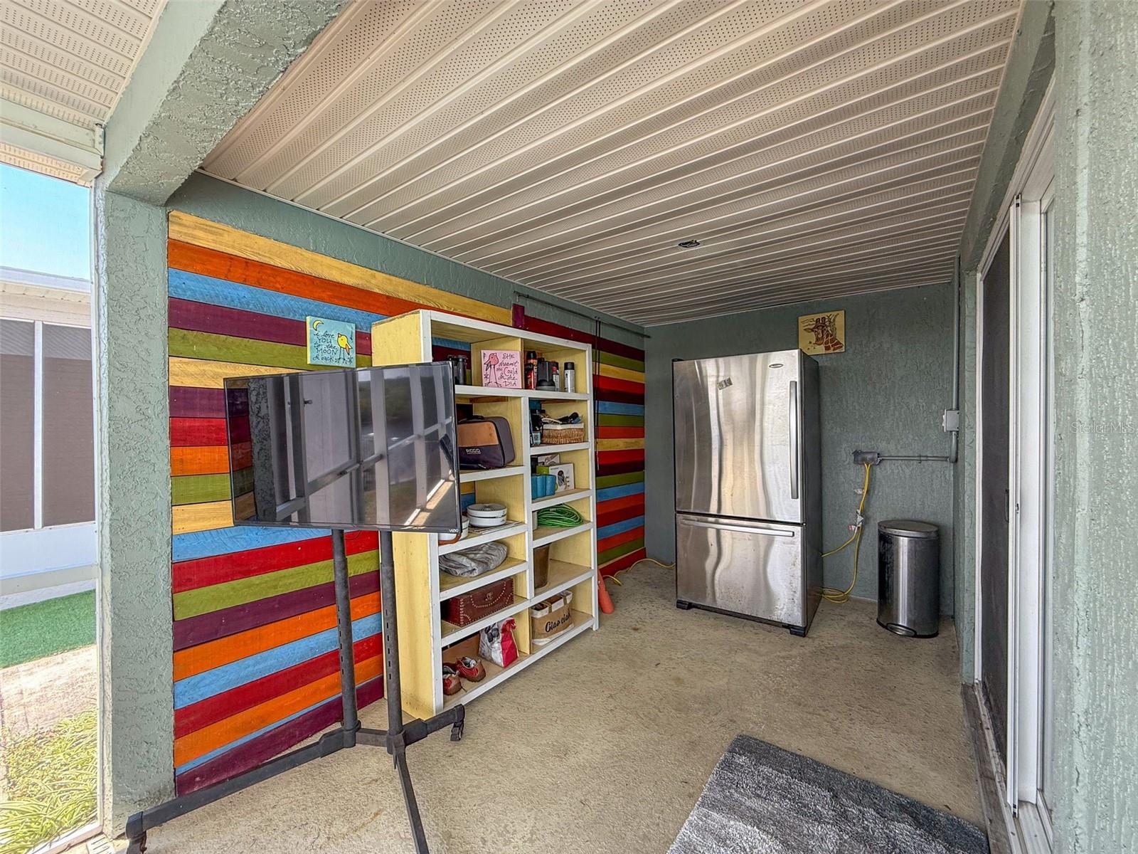 EXTRA COVERED AREA OFF THE POOL
