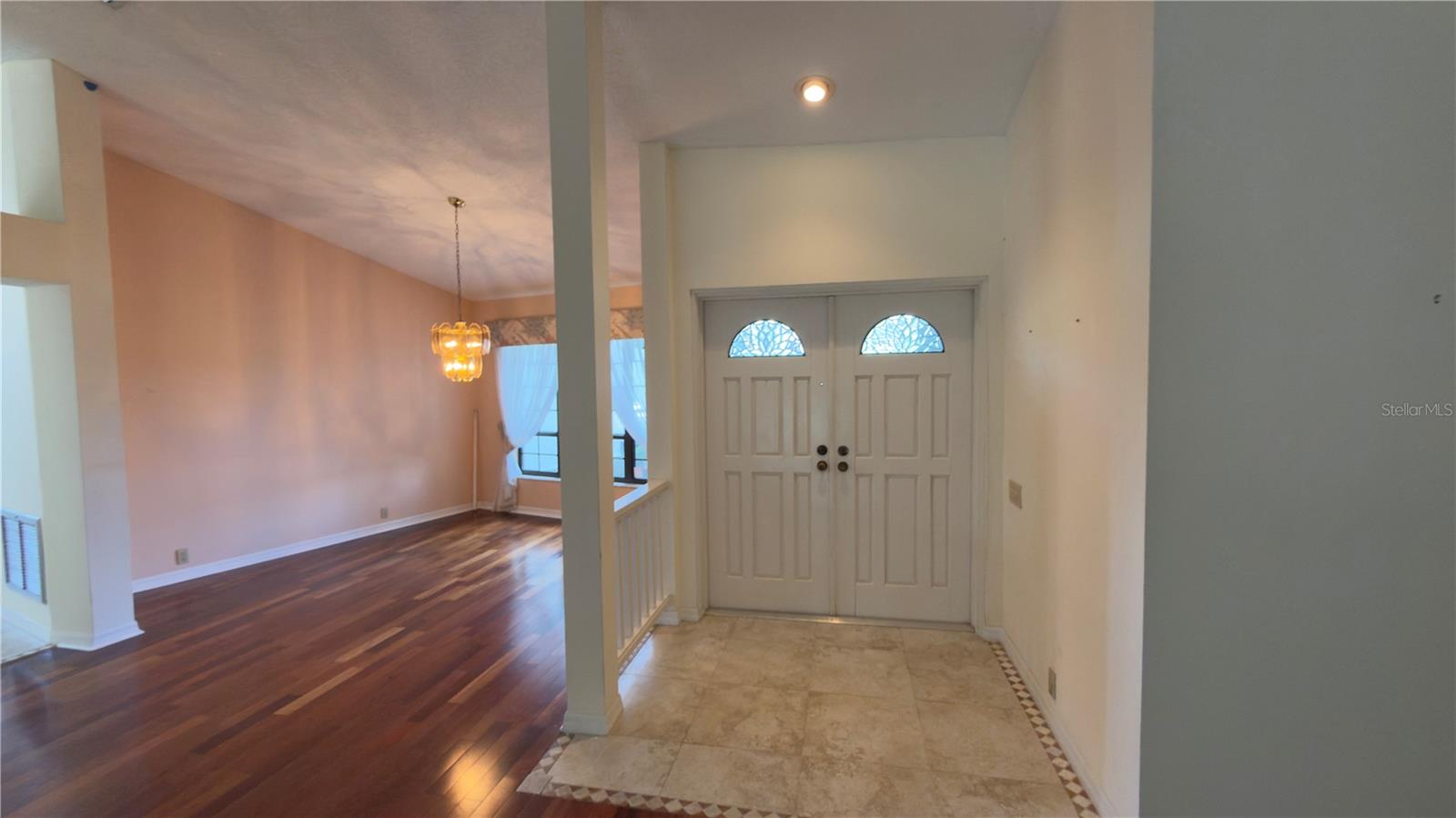 view of dining room &  front door entrance