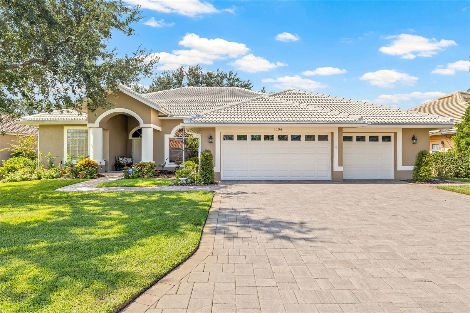 Stunning single-level home with 3 car garage for all your storage needs!