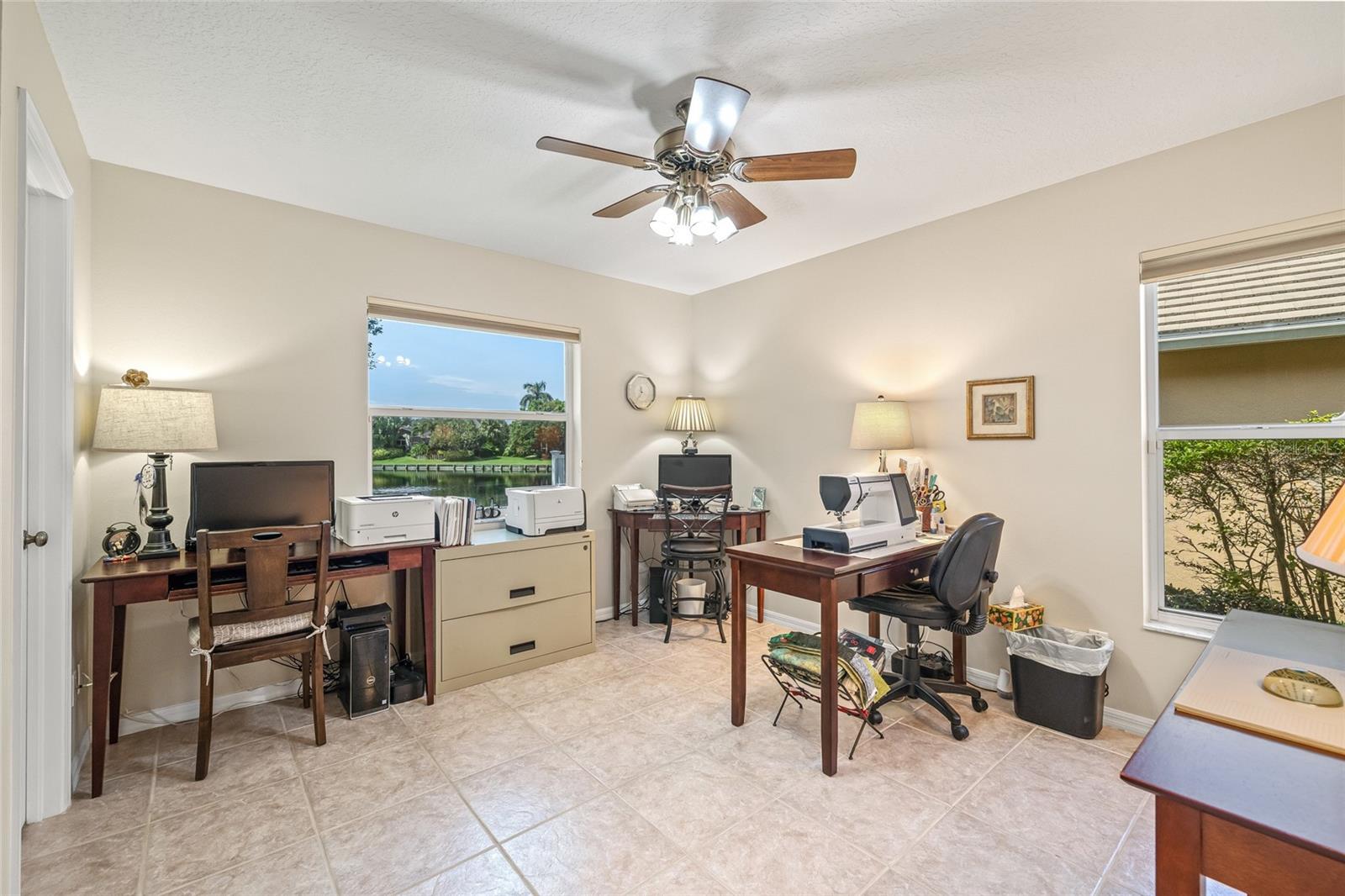 Office/Bedroom 2 has stunning lake views and a walk in closet with electrical receptacles. Great for office use.