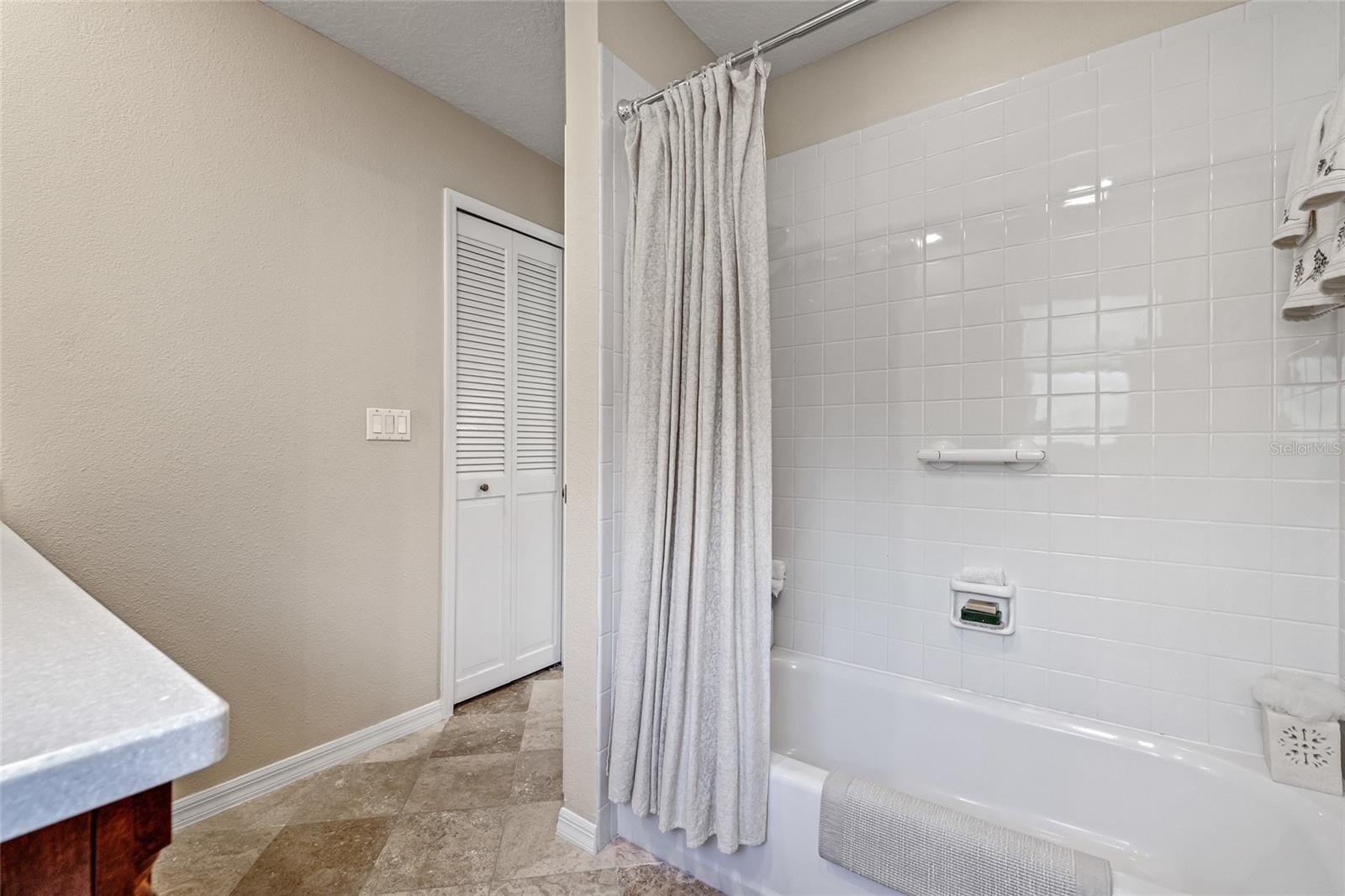 Second bathroom has a tub.