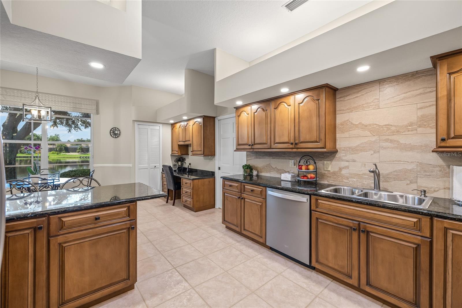 Beautifully updated lakeview kitchen with custom Maple cabinetry.