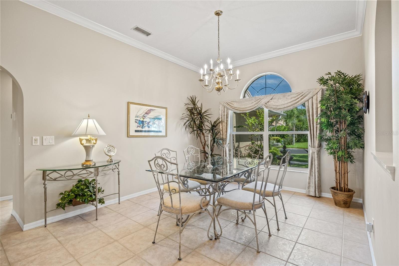 Dining room overlooks the outdoor fountain.